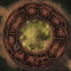 an aerial view of a round building in the woods