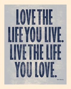 a blue and white poster with the words love the life you live, live the life you love