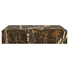 a brown and white marbled box sitting on top of a table