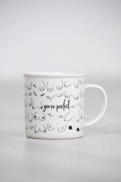 a white coffee cup with black writing on it that says you're perfect in front of a white background