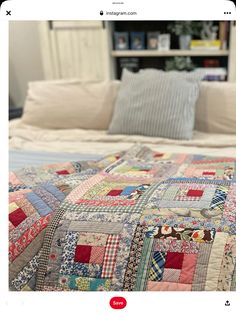 an image of a bed that is made up with quilts on the sheets and pillows