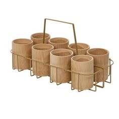 six wooden cups and a metal holder on a white background