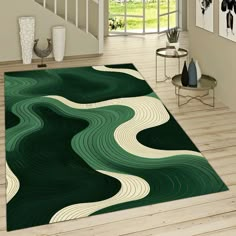 a living room area rug with green and white swirls on the floor in front of stairs