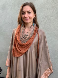 This beautiful desert shawl is a one of the kind creation. It can be worn as a headpiece, a belt, a scarf or a wrap. It comes with two detachable layers: a gauze cotton, hand-dyed by Lunara Love herself, and a stretch cotton jersey layer. This gorgeous beduin style desert scarf is lovingly hand crafted by Lunara Love of Lunara Design for our collaborative collection "Nomad Life" Being a nomad is like being a free spirit, a desert dweller who is ready to let go of the things that don't really mat Bohemian Shawl For Layering, Bohemian Brown Silk Shawl Scarf, Brown Bohemian Silk Shawl Scarf, Bohemian Sheer Dupatta Shawl, Bohemian Style One Size Scarf Wrap, Bohemian One Size Scarf Wrap, One Size Bohemian Pashmina Shawl, Bohemian One-size Pashmina Shawl, One-size Bohemian Pashmina Shawl