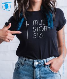 One of our Best Sellers - True Story Bro ™ just got better! - A ladies / women's TRUE STORY SIS ™ Christian graphic t-shirt of the cross, telling the story of Jesus our Savior - it's a true story, SISTER. YOU ASKED FOR IT, YOU GOT IT! YUP. FLAT RATE $6.95 USA SHIPPING ON EVERYTHING. This tee features a 1 color t-shirt design - See pics for color variations,design and layout Offered in our UNISEX fit adult size short sleeve, also available in other custom size just ASK! **THIS IS NOT A TIGHT LADIES FIT TEE** Checkout our other Christian tees. You might be glad you did ( wink). This design is copyright 2023 © NeverSayDie | DBA ChristianTshirtGuy - Sorry I have to post this, but too many "Christians" are stealing my designs, it's not OK. Story Of Jesus, Jesus Our Savior, Jesus Stories, Our Savior, Christian T Shirt, Christian Tees, Christian Shirts, True Story, Custom Logo Design