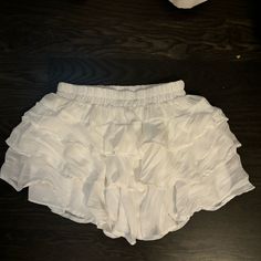 Super Cute Flowy Skirt! Still Has Its Tags On!!! White Lined Skirt Shorts For The Beach, Vacation Lined Skirt Shorts, White Summer Bottoms For Party, Short Lined Skirt For Vacation, Vacation Short Lined Skirt, Vacation Skirt Shorts With Ruffles, Vacation Ruffled Skirt Shorts, White Lined Skirt Shorts For Vacation, White Skirted Shorts For Beach