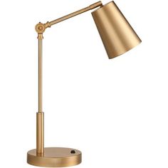 a gold desk lamp on a white background