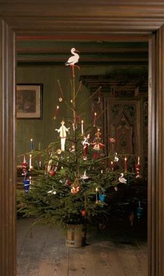 a small christmas tree in a room