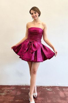 Strapless Fuchsia Ruched Short Dress with Bow Satin A-line Mini Dress With Ruched Bodice, Ruched Strapless Mini Dress For Formal Events, Prom Mini Dress With Pleated Bodice, Pleated Bodice Mini Dress For Prom, Satin A-line Corset Dress For Party, Cocktail Mini Dress With Ruched Bodice Fit And Flare, Fit And Flare Mini Corset Dress For Party, Cocktail Mini Corset Dress With Ruched Bodice, Evening Mini Dress With Ruched Bodice And Fit-and-flare Style