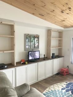 the living room is clean and ready to be used as a media room or office