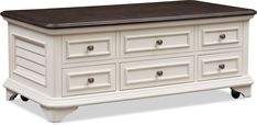 a white and brown dresser with drawers on it's sides, in front of a white background