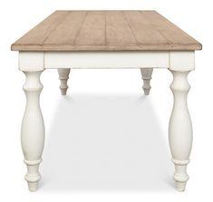 a wooden table with white legs on a white background