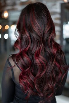 Highlights Brown Hair With Red, Brown With Red Hair Highlights, Cherry Red Hair With Black Highlights, Bold Winter Hair Colors, Red And Brown Hair Color Ideas, Colored Highlights For Dark Brown Hair, Red Violet Highlights On Dark Hair, Dark Brown Hair With Maroon Highlights, Black With Red Undertones