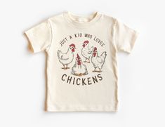 Just A Kid Who Loves Chickens Toddler Shirt - Backyard Chicken Farmer Kid's Shirt - Chicken Obsessed - Boho Natural Toddler & Youth Tee If you love super soft, lightweight, extremely comfy shirts and baby bodysuits then you will absolutely love our unisex kids shirts and baby bodysuits! These shirts are hand printed with a professional garment printer for a soft, durable, long lasting, printed graphic using high quality water based inks. * The printed design is very soft to the touch due to our Chicken Shirt Design, Chicken Shirt, Chicken Shirts For Kids, Funny Chicken Tshirts, Chicken Tee Shirts, Toddler Humor, Comfy Shirts, Baby Size, Kid Tees