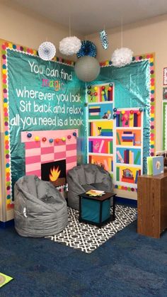 this classroom is decorated in bright colors and has bean bag chairs, bookshelves, and a fire place