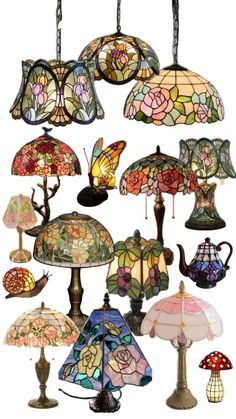 many different lamps hanging from the ceiling with flowers and butterflies on them, all in different colors