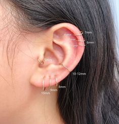 a woman's ear is shown with the measurements