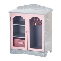 a pink and grey wooden doll's wardrobe with polka dots