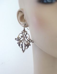 "Vintage Jewelry - Vintage Earrings - Art Nouveau Earrings - Brass Earrings - Statement Earrings - Chloe's Vintage Handmade Jewelry I love these Art Nouveau earrings! A gorgeous graceful natural leaf shape. So stunning. Chloe says, Wear them and feel fabulous!\" They measure 2\" long from the top of the ear wire. Thanks for visiting Chloe's" Victorian Bronze Pierced Earrings, Victorian Style Bronze Pierced Earrings, Bronze Pierced Earrings For Formal Occasions, Formal Bronze Pierced Earrings, Victorian Style Single Earring For Gift, Victorian Style Silver Earrings For Pierced Ears, Ornate Bronze Earrings For Gift, Elegant Bronze Metal Plug Earrings, Elegant Bronze Pierced Chandelier Earrings