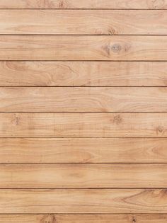 a close up view of the wood grains on a wooden flooring board wall