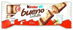 kinder bueno chocolate bar with 2 bars in each wrapper and one glass of milk