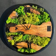 a clock made out of wood and green trees