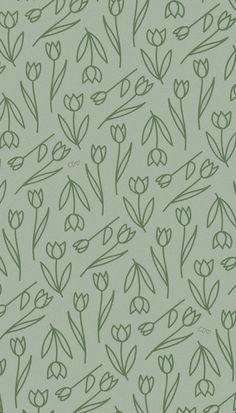 a green background with flowers and leaves on it