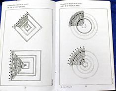 an open book with drawings on the pages and numbers in each section, including circles