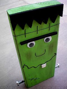 an image of a green box with eyes and mouth