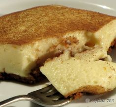 a piece of cheesecake on a plate with a fork