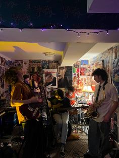 a group of people playing instruments in a room