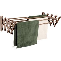 a towel rack with two green towels hanging from it's sides and one white towel on the other side