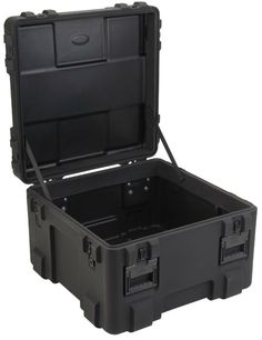 an empty black plastic case with handles and latches on the inside is shown for storage