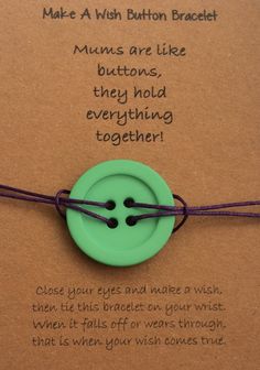 a green button is attached to a brown card with a message about buttons and saying, make a wish button bracelet mums are like they hold everything together