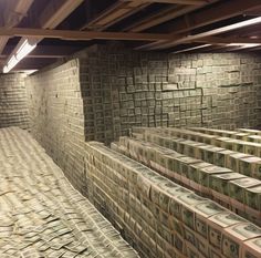 stacks of money are lined up in the basement