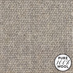 a close up view of the texture of a carpet with an ad for pure wool