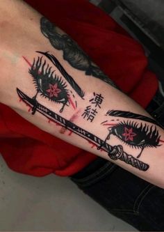 a woman's arm with tattoos on it and two swords in the middle of her leg