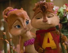 the chipmuns are standing next to each other