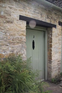 an instagramted photo of a green door