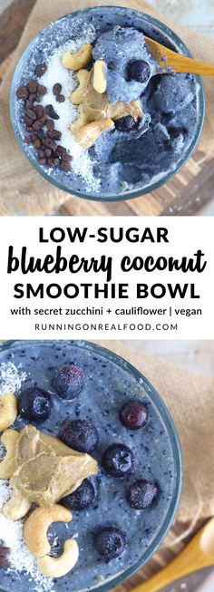 blueberry coconut smoothie bowl with berries and cashews in it on a wooden table