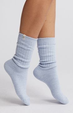 These soft, stretchy ribbed socks have a cozy slouchy fit through the ankles and reinforced heels and toes for durability. 99% polyester, 1% elastane Machine wash, tumble dry Imported Trendy Stretch Soft Socks, Trendy Soft Stretch Socks, Super Soft Stretch Comfortable Socks, Comfortable Warm Solid Color Socks, Super Soft Stretch Socks, Comfortable Super Soft Stretch Socks, Soft Stretch Socks For Fall, Casual Super Soft Stretch Socks, Warm Stretch Casual Socks