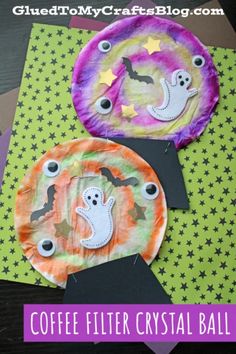 two paper plates with halloween decorations on them and the words coffee filterr crystal ball