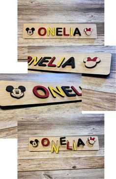 three wooden name plaques with mickey mouse and minnie mouse faces on them, one has the word