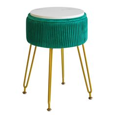 a green velvet stool with gold legs and a white cushion on the top is shown