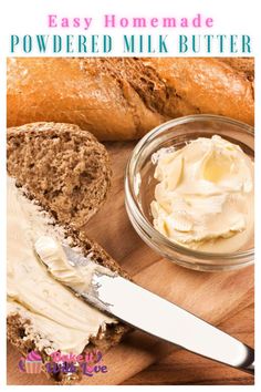 homemade powdered milk butter in a glass bowl next to bread on a cutting board