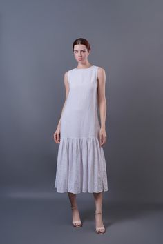 "Low Waist Linen Dress, Relaxed fit Linen Midi Dress Handmade linen dress, Linen Summer dress,  Women Linen Clothing - Dress length is 127cm (50 inches) - Mid-calf length for our model who is 174cm (5'9'') tall - Made from High quality linen, 100% pure linen, and only get better with time - Low Waistline - Unlined bodice, Please contact me if you want it lined - Handmade at our studio - Made to order.  - Made to measurement is an option! Please message us if you would like to discuss more. Please read carefully to choose the right size: * XS (UK 6, USA 2) Best for busts up to 32'' (81 cm). Best for waists up to 26\" (66 cm). * S (UK 8, USA 4) Best for busts: 32-33'' (81-84 cm). Best for waists 26-27\" (66-69 cm). * S/M (UK 10, USA 6, EURO 38) Best for busts: 33-34.5'' (84-88 cm). Best for Beach Midi Linen Dress, Spring Linen Dress For Daywear, Spring Daywear Linen Dress, White A-line Linen Dress, Linen Summer Dress For Daywear, Spring Linen Dress For Beach, Summer Dresses In Flax Color And Material, Summer Dresses In Flax, White Ramie Beach Dress