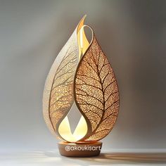 a lamp that is shaped like a leaf