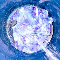 a blue and white object floating in the water