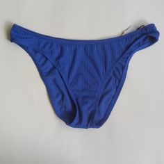 Nwt Excellent Condition Color: Royal Blue Material: Shell-92% Recycled Polyester 8% Spandex Lining: 100% Polyester Offers Welcomed Blue Swimwear For Pool, Blue Elastane Swimwear For Poolside, Blue Elastane Swimwear For Vacation, Blue Vacation Swimwear, Blue Elastane Brief Swimwear, Blue Swimwear For The Beach, Blue Elastane Swimwear For The Beach, Blue Swimwear For Beach, Casual Blue Brief Swimwear