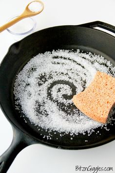 a frying pan that has some kind of sponge in it with sugar on top